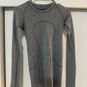 Grey long sleeve Lululemon top. Slight sparkle in the threads